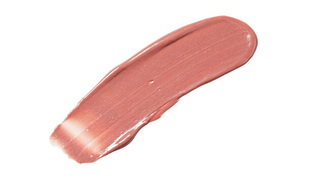 Smear of shimmery rose gold makeup cosmetic product with cosmetic lipstick isolated background skincare