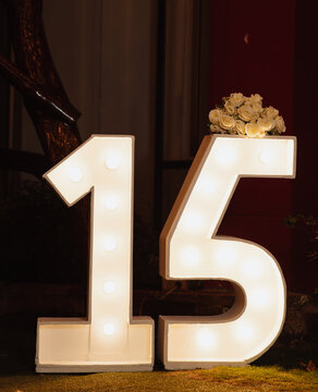 sign with the number 15 at an event