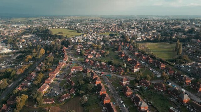 Sunlight glows over quiet suburban streets