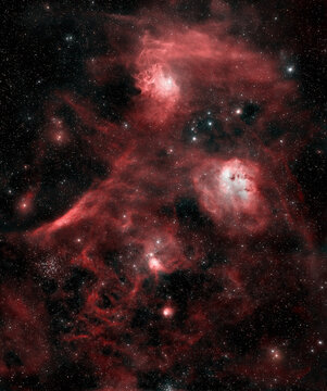Deep sky astrophotography with beautiful red shapes of the Flaming Star emission reflection nebula and the Tadpole nebula 
