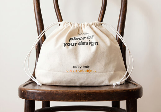 Cotton Pouch Bag on Wooden Chair Mockup