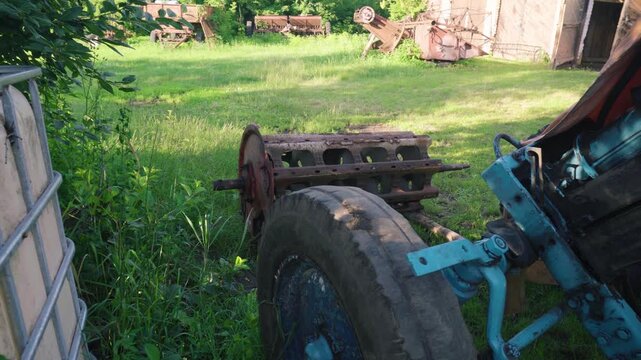 old red combine harvester repair threshing machine replacement of whips on the drum welding work to improve the efficiency of the unit
