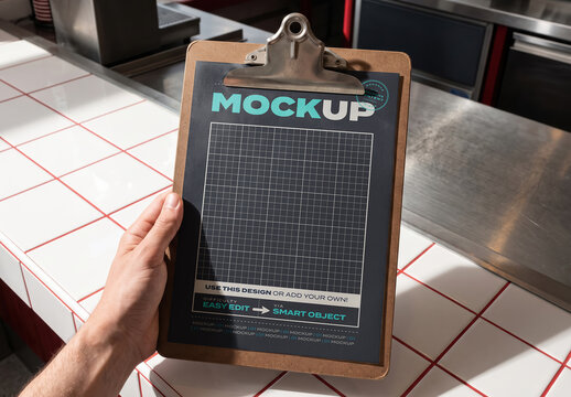 Hand Holding Restaurant Menu Page with Clip Mockup