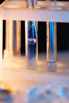 Vertical test tube rack with diamond in tube for laboratory background and scientific