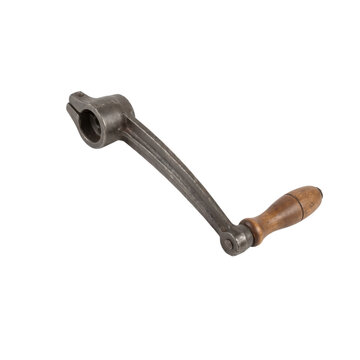 Vintage metal crank handle with wooden grip on transparent background
