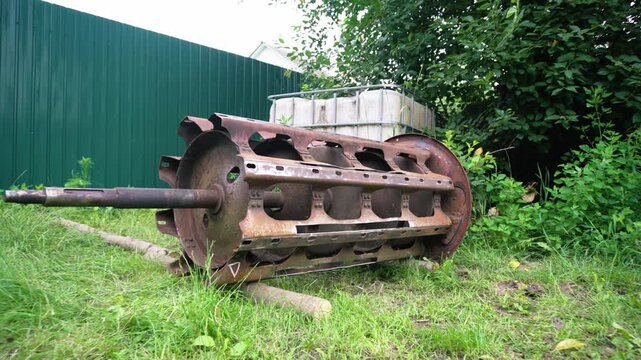 old red combine harvester repair threshing machine replacement of whips on the drum welding work to improve the efficiency of the unit