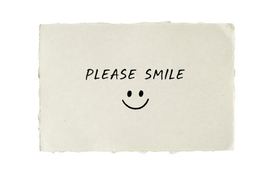 Rectangular paper note with deckled edges featuring the text please smile and a handwritten smiley face isolated on a transparent background