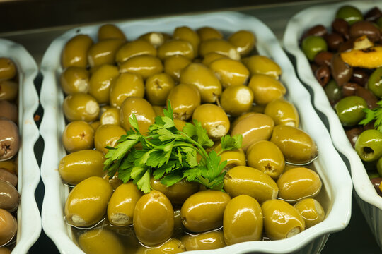 Green Olives Stuffed with Garlic and Garnished with Fresh Parsley