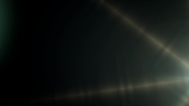Dynamic and realistic optical lens flare effect moving across a dark digital background