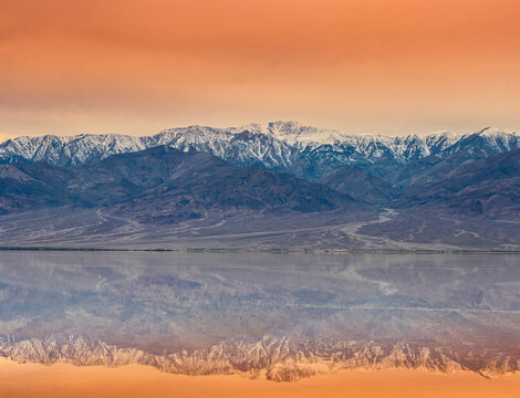 Sunset Reflections Over The Pannamint Mountains on Bad Water Basin and Flooded Manly Lake, Death Valley National Park, California, USA
