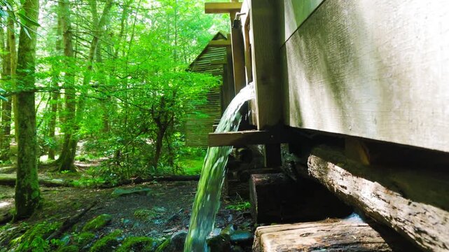 Water Running From The Wooden Flume at The Historic John P. Cable Grist Mill at The Cable Mill and Historic Area, Cades Cove, Great Smoky Mountains National Park, Tennessee, USA