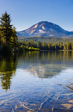 Lassen Peak and The Surrounding Forest Reflection on Manzanita Lake, Lassen Volcanic National Park, California, USA