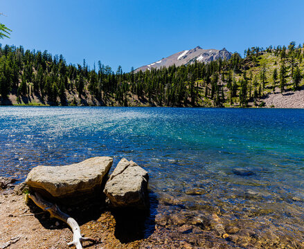 The Beautiful Turquoise Waters of Shadow Lake With Lassen Peak in The Distance, Lassen Volcanic National Park, California, USA