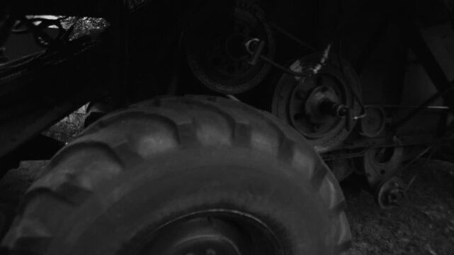 old red combine harvester repair threshing machine replacement of whips on the drum welding work to improve the efficiency of the unit