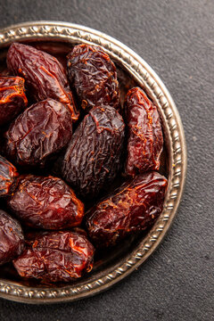 Dates sweet dessert edible fruits of the date palm food preparation tasty snack fresh and delicious gourmet food background on the table rustic food top view copy space keto and paleo 