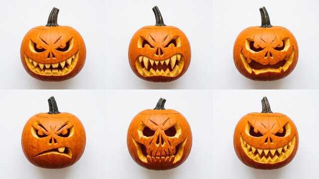 Set of six carved halloween pumpkins with different scary and evil facial expressions isolated on white background
