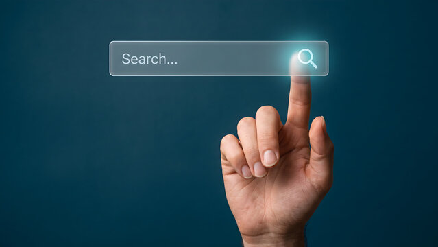 Hand touching digital search bar for web browsing and information discovery concept on dark blue background