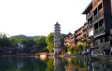 Fototapeta premium Fenghuang Ancient Town Riverside Pagoda and Traditional Wooden Houses, Hunan, China
