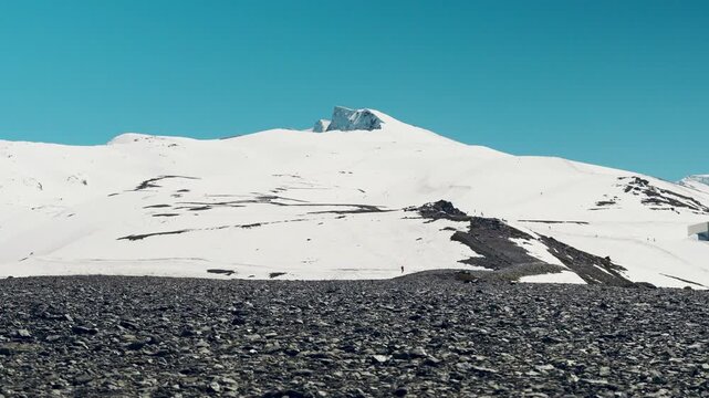 Veleta Mountain in Sierra Nevada, Granada, Spain with Skiers
