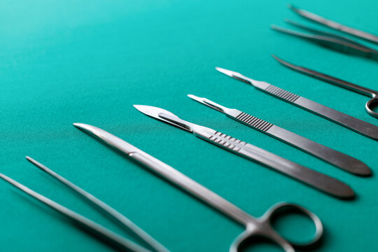 Surgical tools on green background