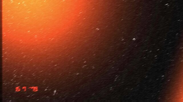 Animated fast light leak transition with warm orange film burn, dust particles, and vintage camcorder date stamp for 4K video overlays.