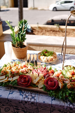 Charcuterie Platter and Appetizer Spread on Outdoor Table for Casual Party or Gathering