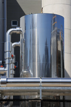 View of insulated cylindrical vessel and data centre cooling pipework
