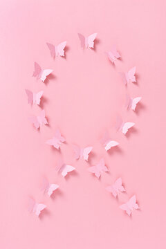 pink paper butterflies ribbon breast cancer awareness minimalist abstract background