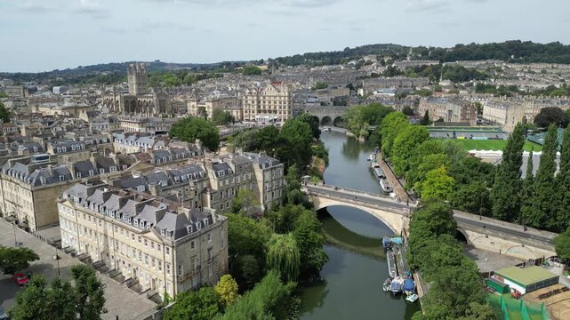 Drone fly forward shot over River Avon in historic Bath Somerset England
