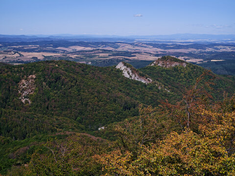 Panoramic view from Kapu-berc over the forested Verebce Ridge, Dedes Small Castle hill and Dedes Castle area in the Bukk Mountains of northern Hungary.