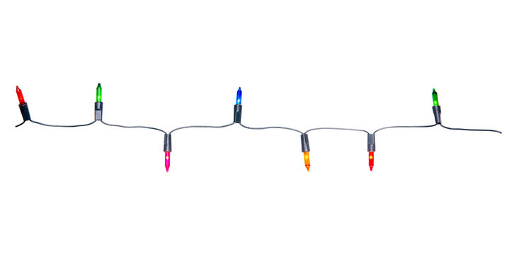 String of Christmas lights isolated on transparent background.