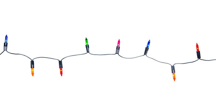 String of Christmas lights isolated on transparent background.
