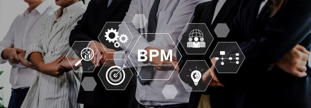 Diverse professionals collaborate on effective business process management strategy, emphasizing teamwork, innovation, and solutions in a modern office atmosphere. Trope