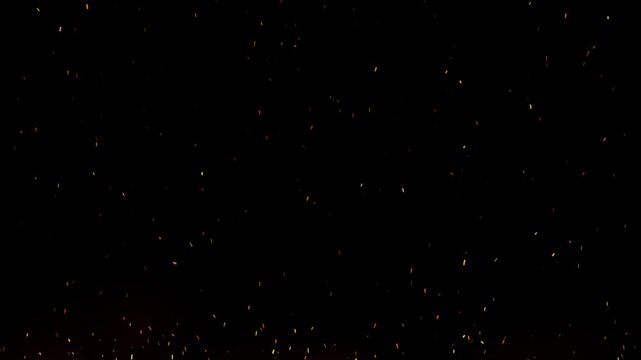 Glowing fire sparks floating on black background, overlay effect embers