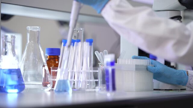 Laboratory equipment arranged on a clean research bench at a well-equipped science laboratory bench, usable as b-roll for healthcare and life science storytelling.