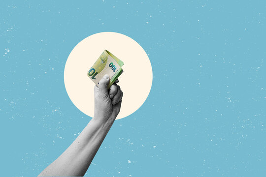 A stack of euro banknotes held in a hand, isolated against a plain background. A thick roll of euro banknotes.