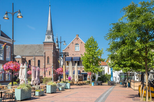 Restaurant terraces and church tower on the central square in Meppel, Netherlands