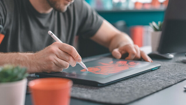Artist drawing on graphics tablet