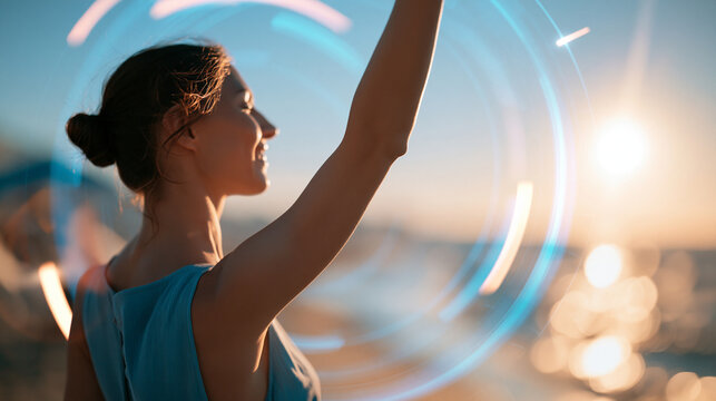 rear view of a woman raising her arm on a bright sunny beach with a futuristic holographic display animating around her, back to camera, technology and innovation concept, coastal