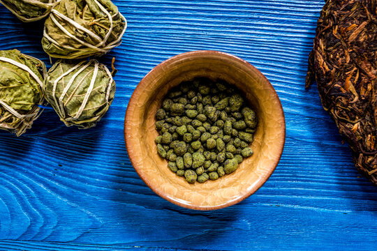 Drink herbal tea with brew blue wooden table background top view