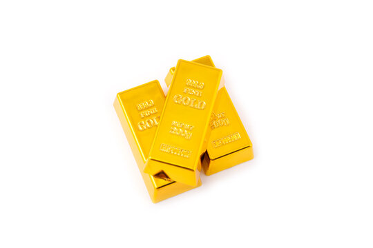 Gold bars isolated on white background. Stack of many shiny gold bars. Fine gold concept. Gold panel background.  Metallic texture. Wealth, luxury, treasure.
