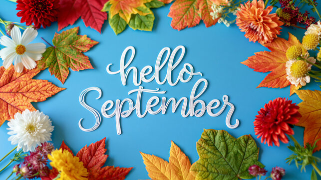 Vibrant hello september message surrounded by colorful autumn leaves and fresh flowers arranged on a bright blue background cheerful seasonal color contrast clean modern layout bright