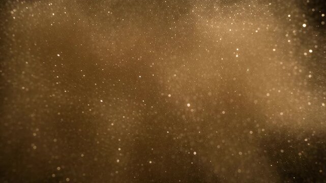 fine golden dust particles suspended in pitch black void