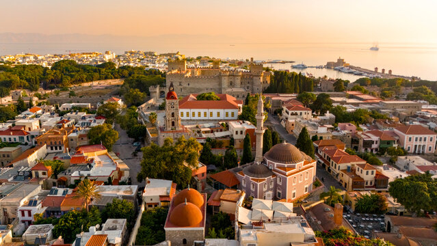 Aerial View of Rhodes Old Town Mosque Domes and Palace of the Grand Master Fortress at Sunrise, Greece