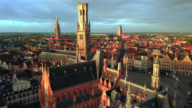 Aerial view of Bruges city with Market Square during sunrise Belgium