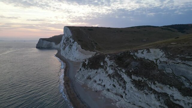 Drone pull back shot from spectacular white chalk cliffs at Bats Head