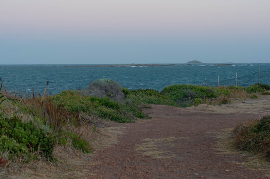 Coastal track overlooking rocky islets in Western Australia