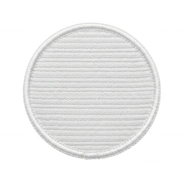 Circular white fabric embroidered patch with ribbed texture isolated on transparent background for apparel design