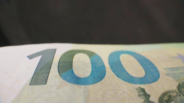 Camera moving over a 100 Euro banknote