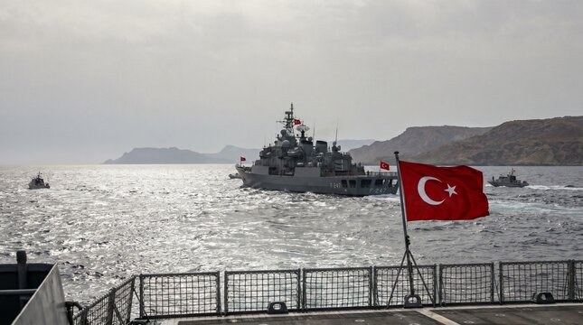Turkish naval vessels patrolling sea with flag flying from deck